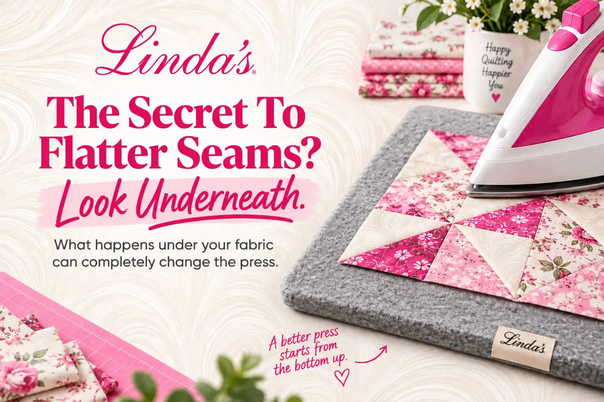 Iron pressing a patchwork quilt block on a gray wool pressing mat — the secret to flatter seams is the surface underneath