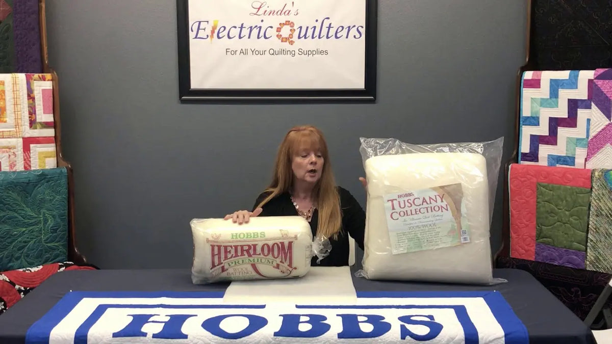 Stephanie Hackney of Hobbs Bonded Fibers showing Tuscany Wool, Heirloom Wool and Tuscany Cotton Wool batting
