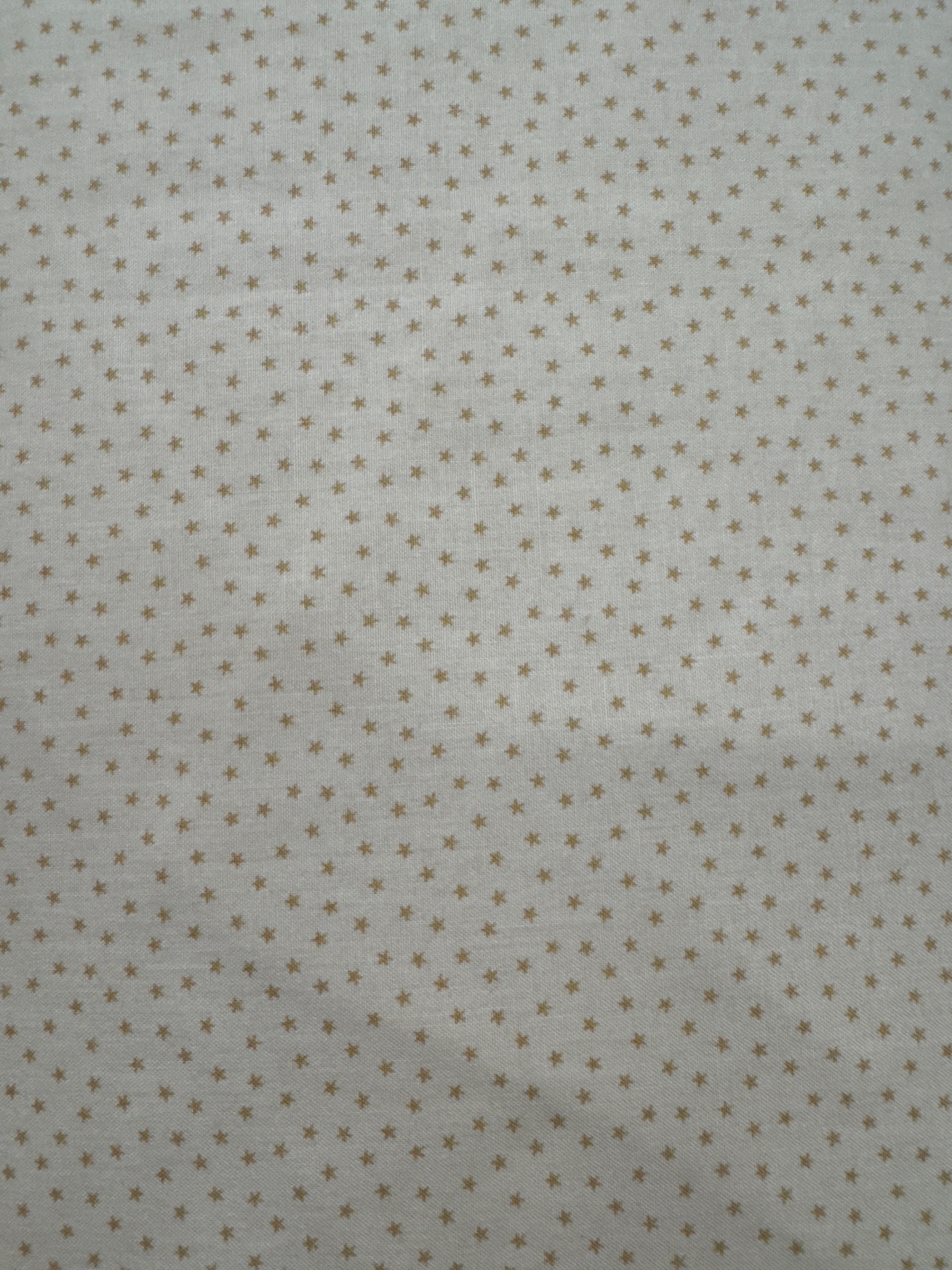Twinkle Small Stars Tan blender quilting fabric by Andover Fabrics
