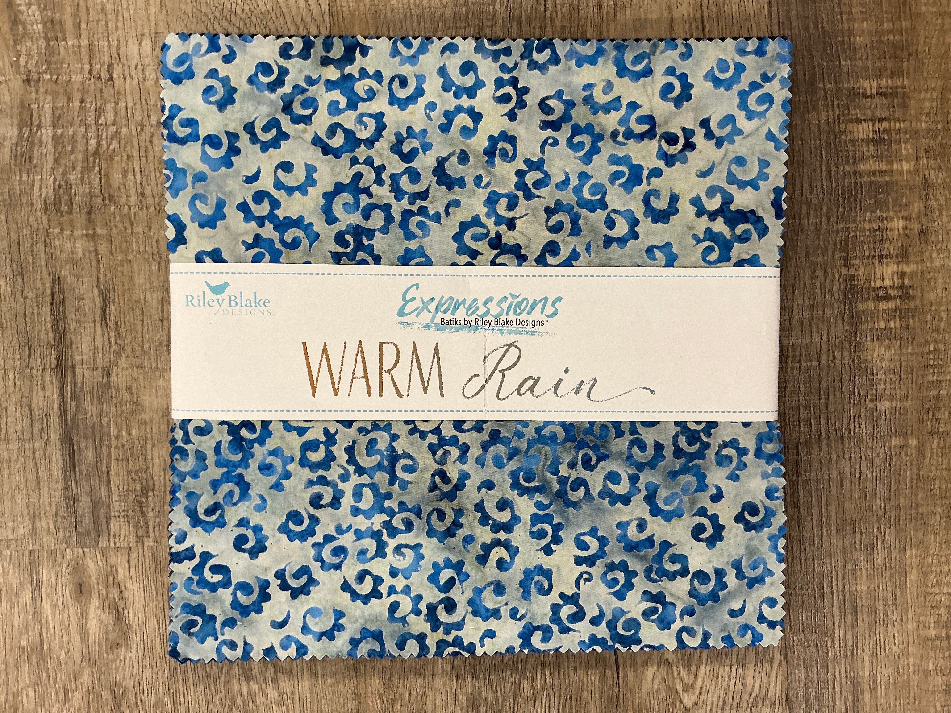 Batiks Warm Rain layer cake precut squares by Riley Blake