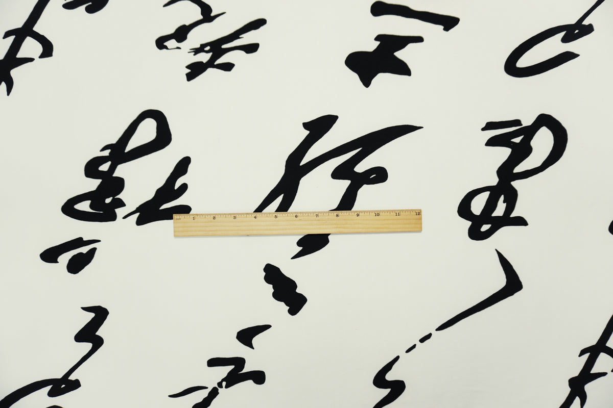 Off-White-Black Poly Calligraphy Printed ITY Jersey Knit Fabric