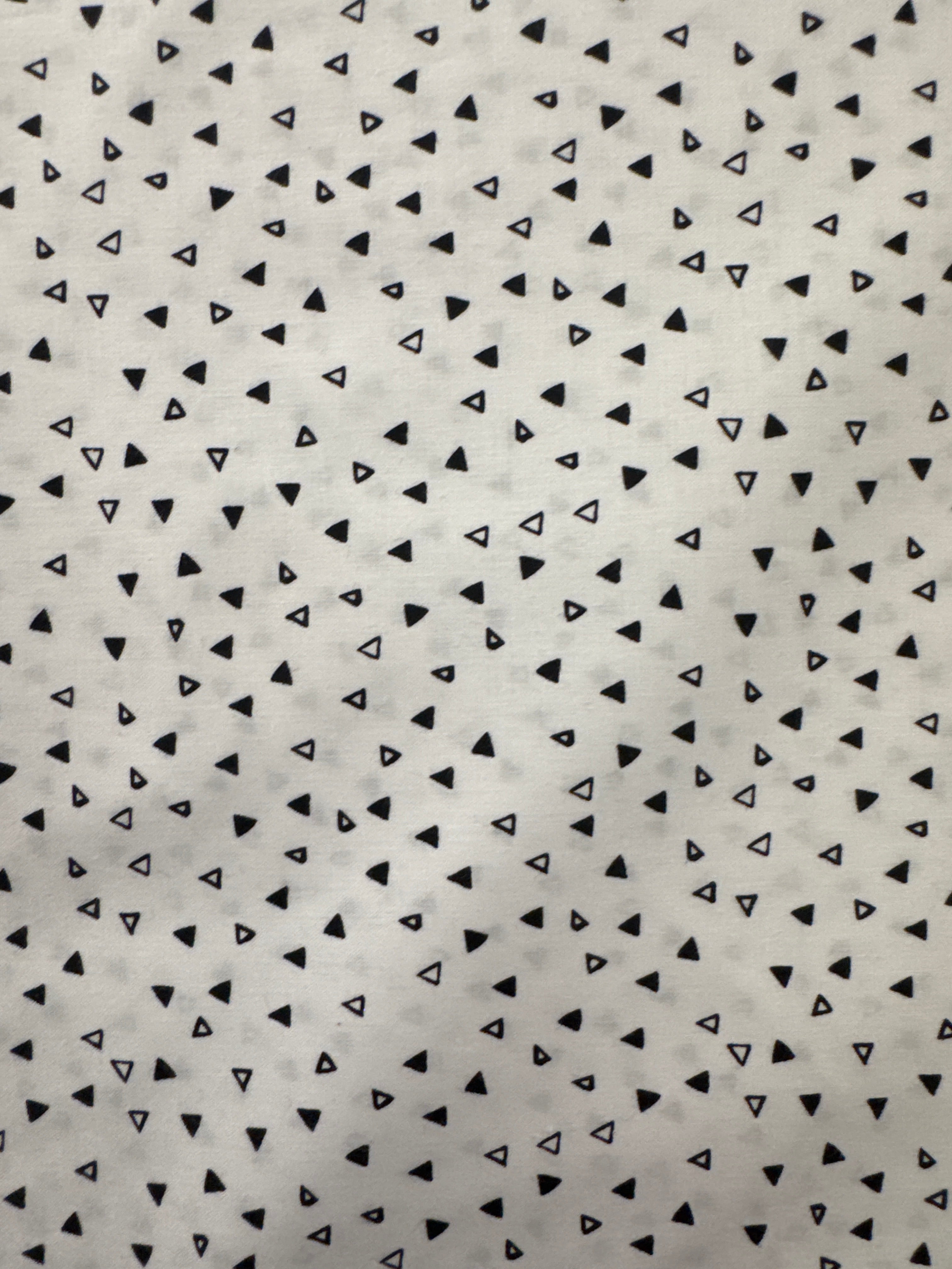 Merlot Triangles Black on White geometric quilting fabric by Clothworks