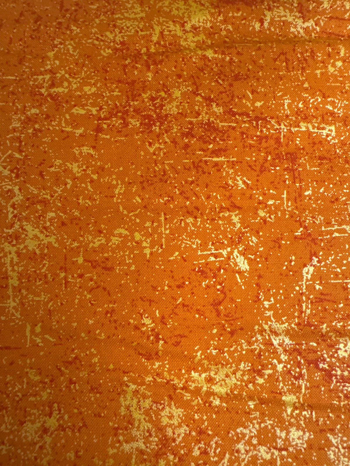 Glisten Tangerine blender quilting fabric by Northcott
