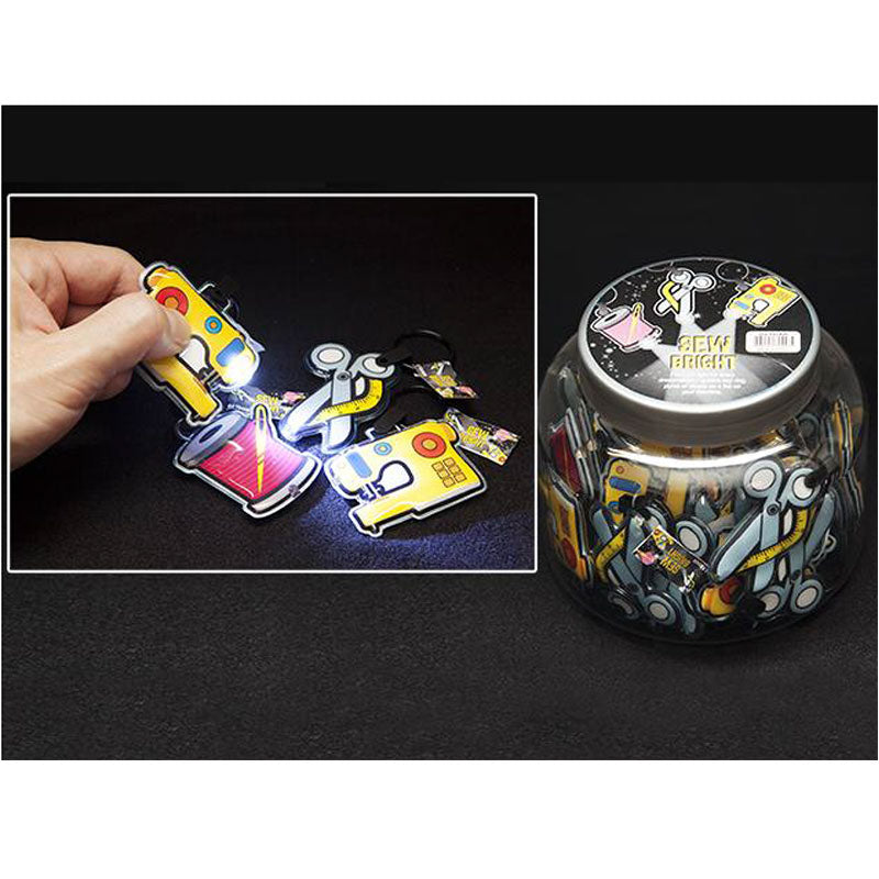 Novelty keychain with built-in LED light