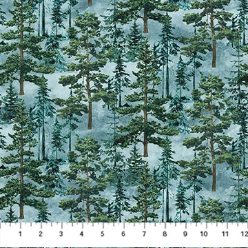 Northcott Stonehenge Eagle Pass Packed Trees quilting fabric in Blue Multi