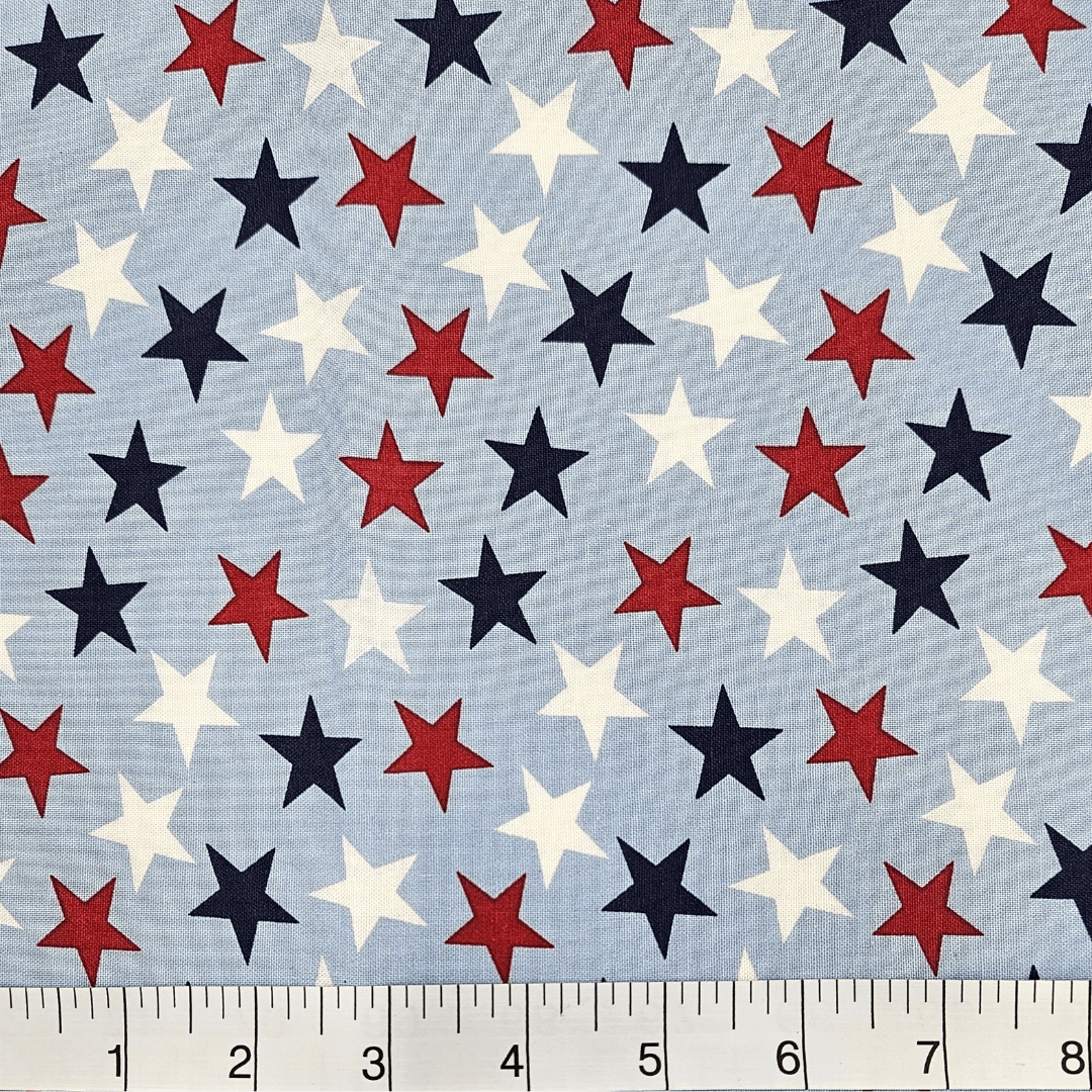 Patriotic Stars 108 inch Supreme Backing Large Stars on Light Blue The Fabric Company