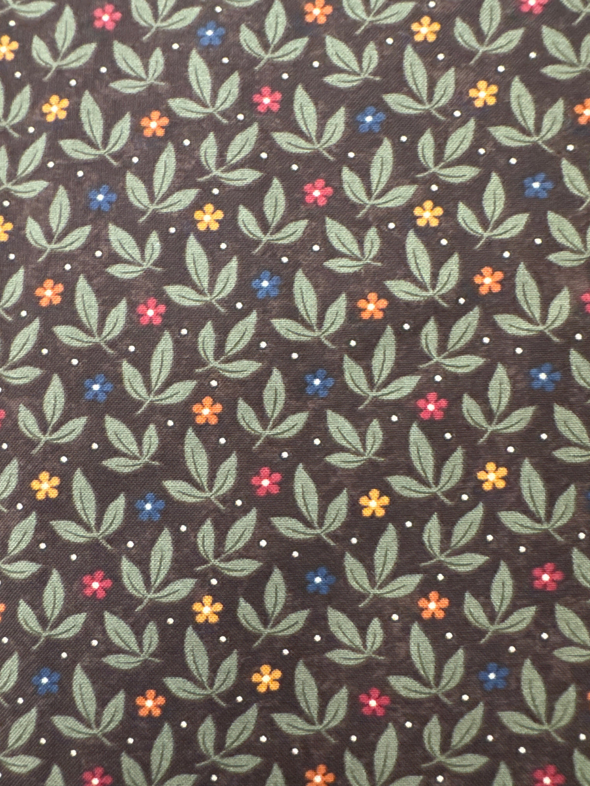 Fluttering Leaves Dark Brown novelty quilting fabric by Moda