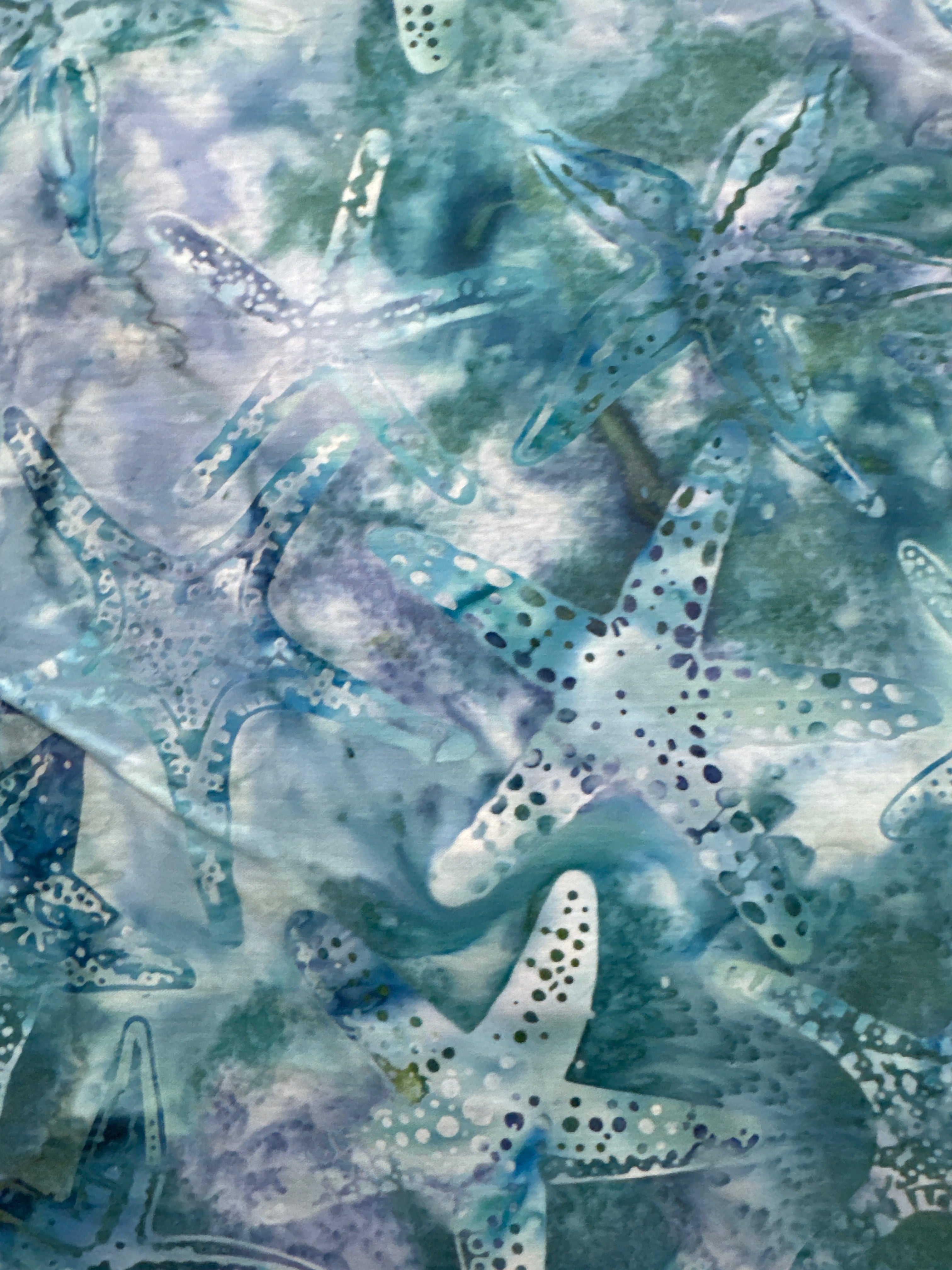Aqua Starfish ocean quilting fabric by Hoffman Fabrics