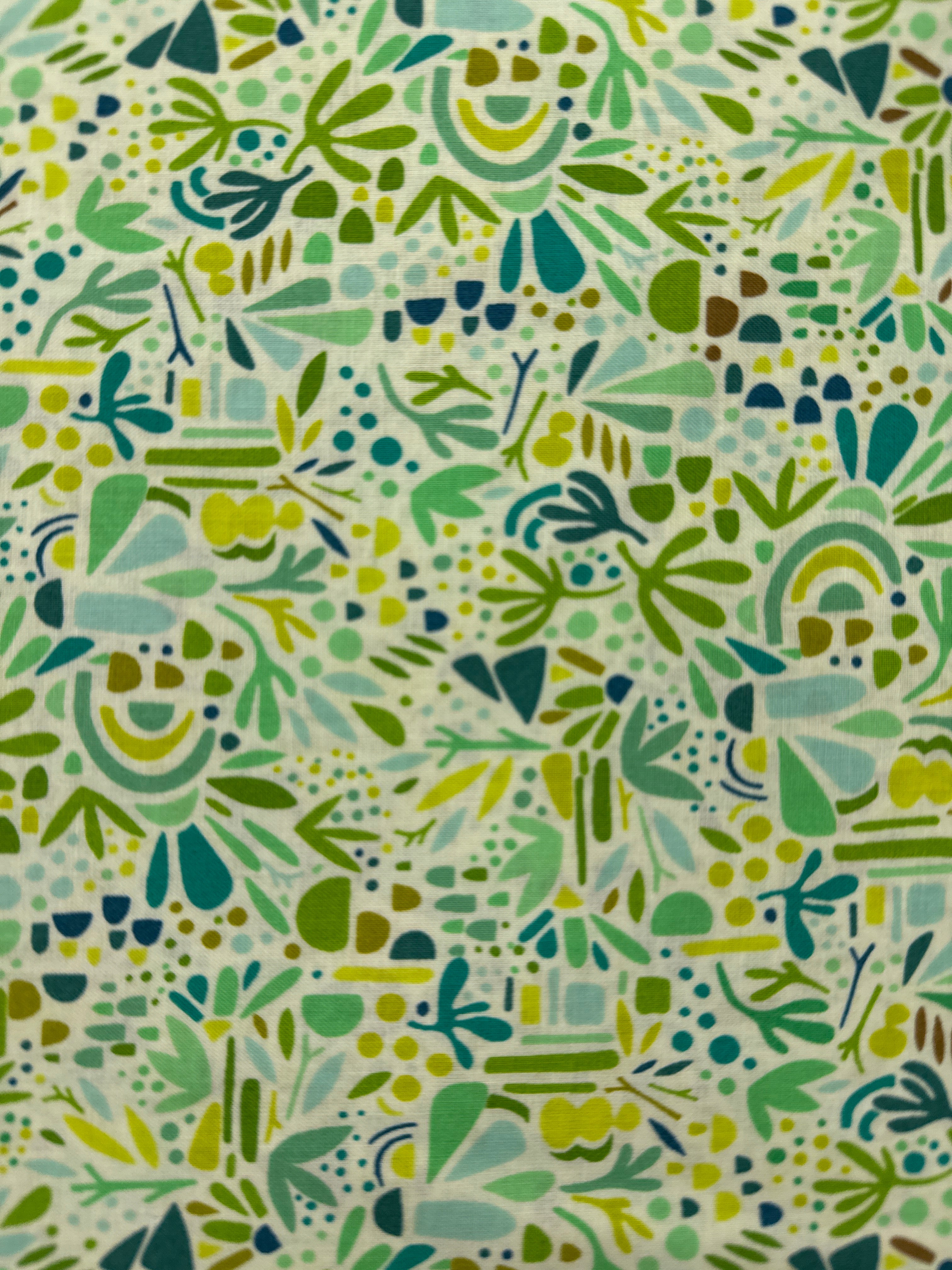 All Shapes and Sizes Green geometric quilting fabric by Windham Fabrics