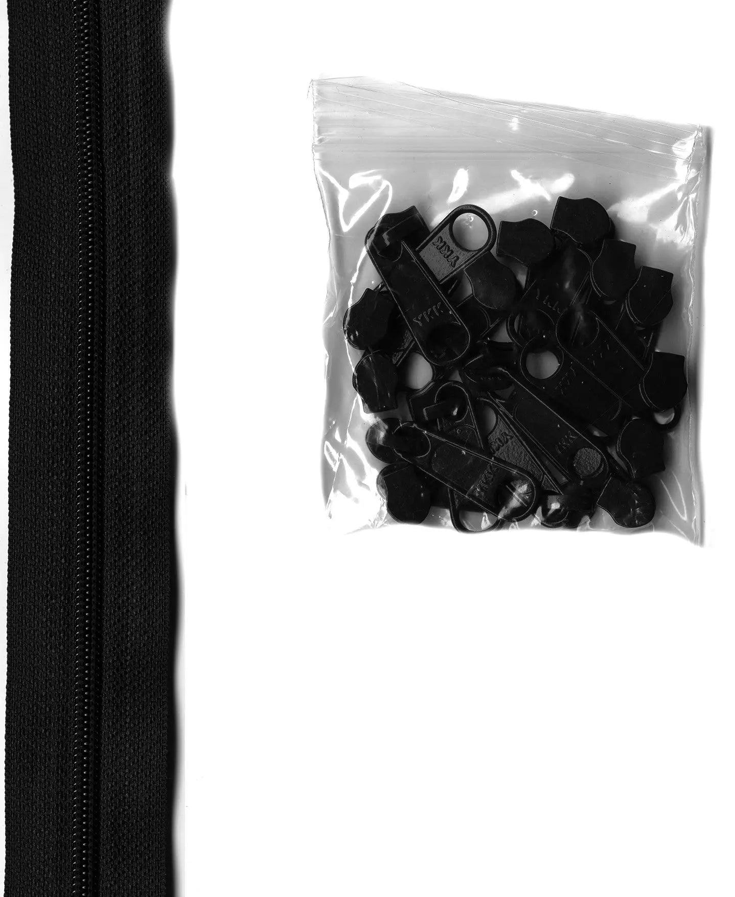 4 yards of 16mm #4.5 zipper chain and 16 Extra-Large Coordinated Pulls Black - Linda's Electric Quilters