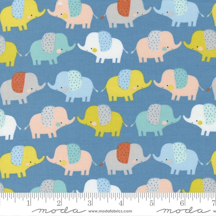 Moda Delivered With Love Blue Multi quilting fabric — baby-themed print in blue multi