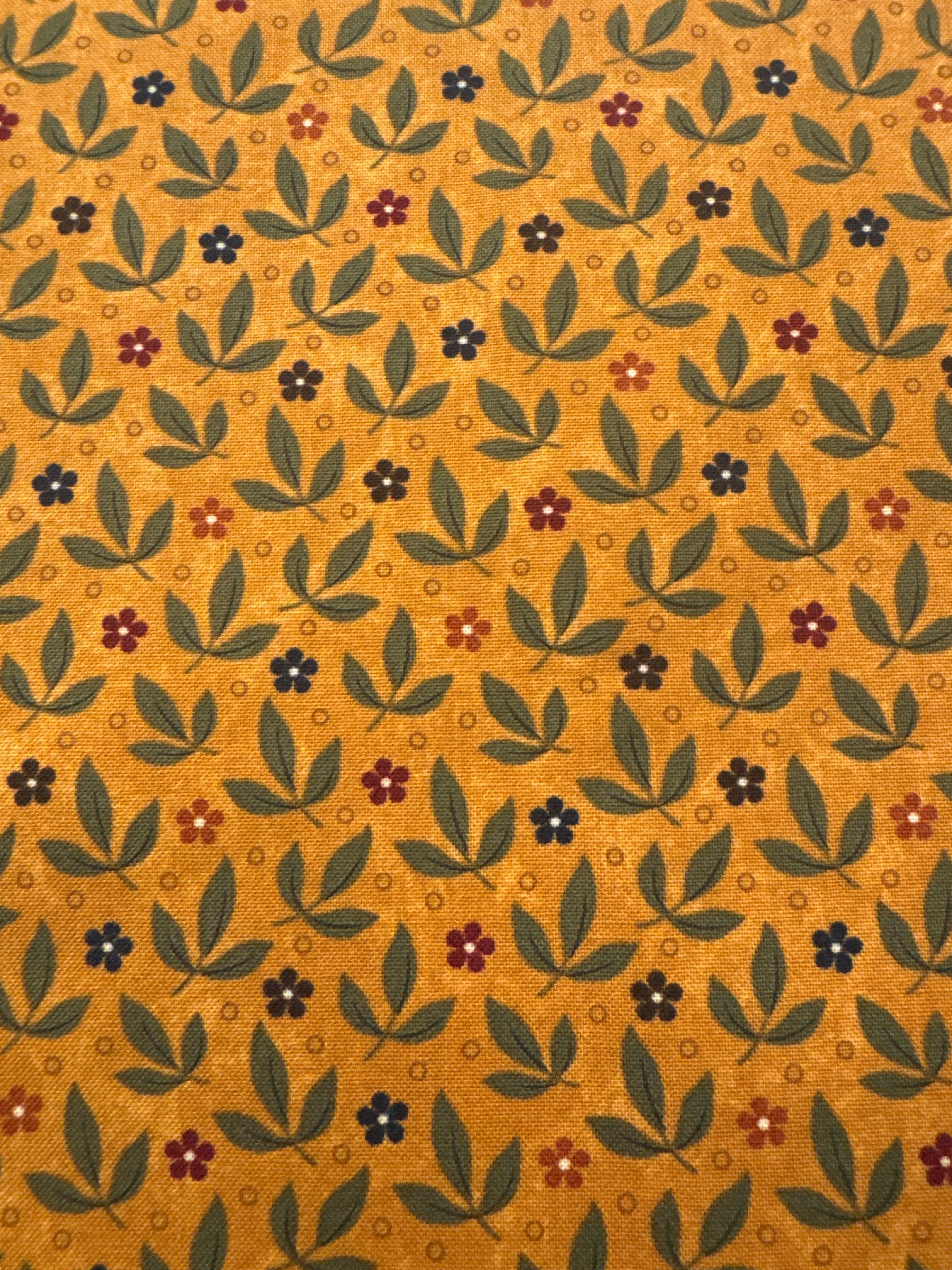 Fluttering Leaves Dark Amber novelty quilting fabric by Moda