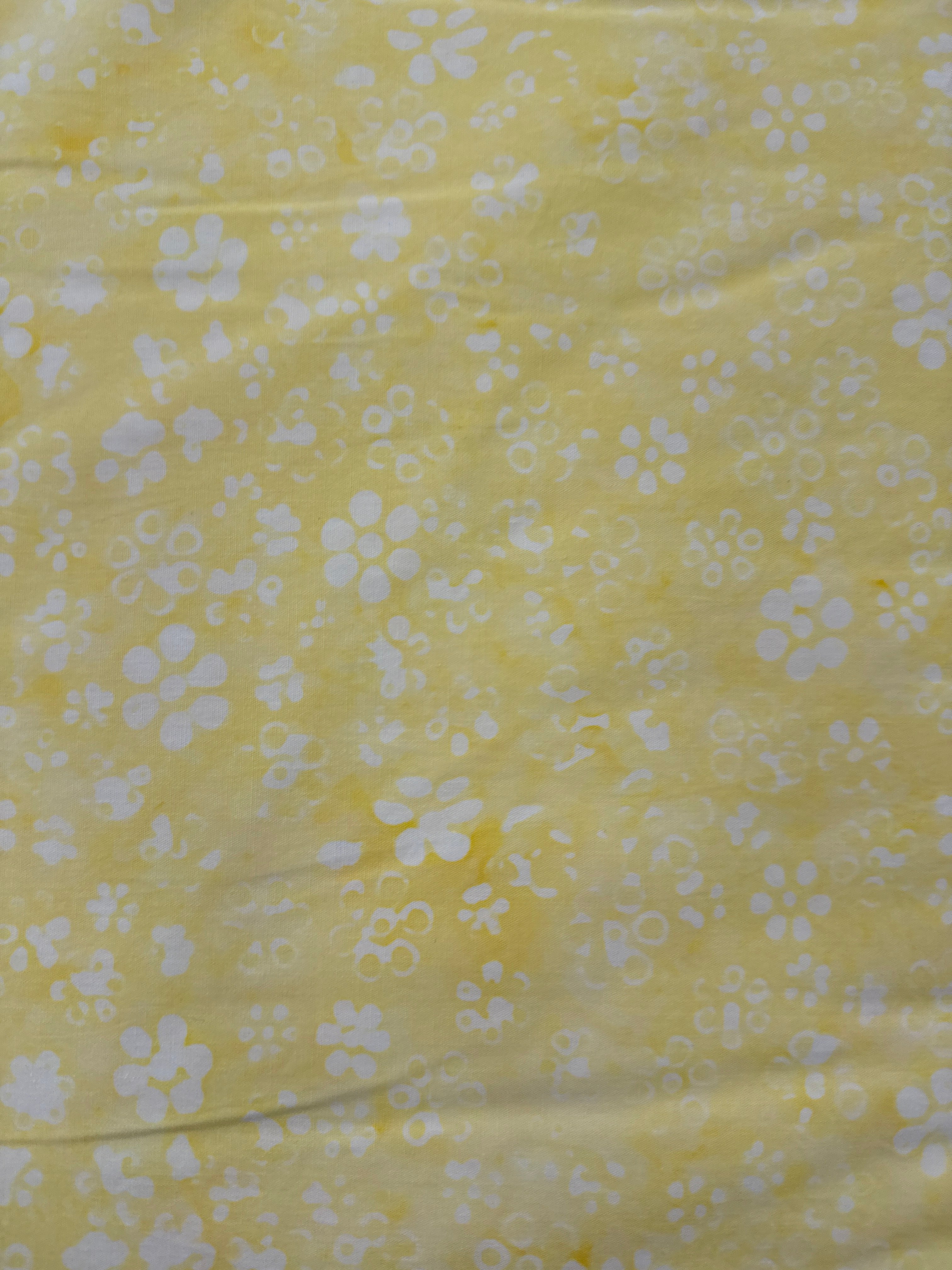 BeColorful Small White Flowers Yellow floral quilting fabric by Andover Fabrics