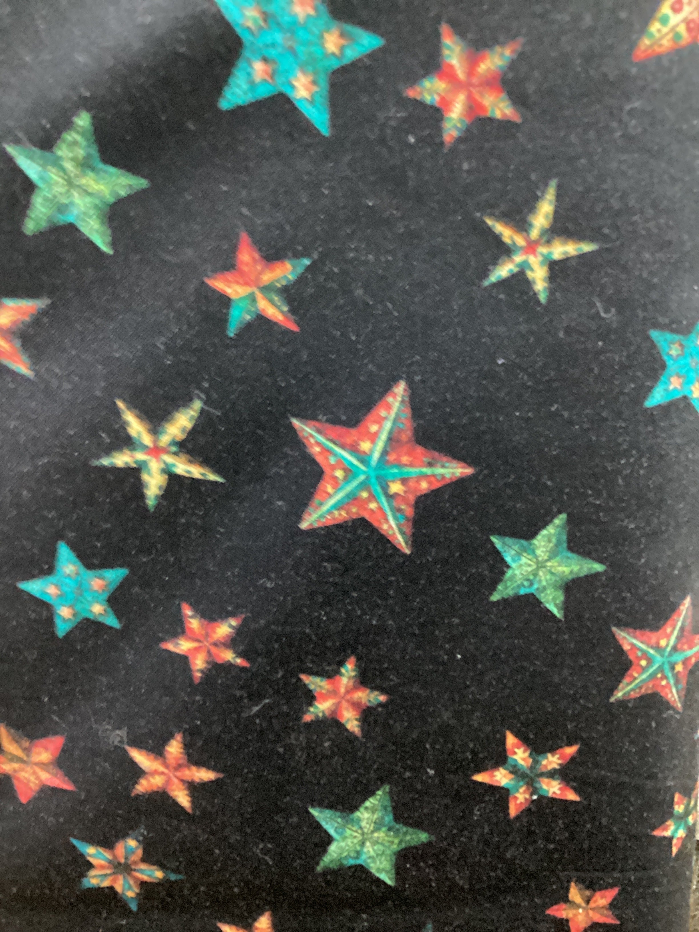 Quilting Treasures Santas Workshop Stars Black quilting fabric