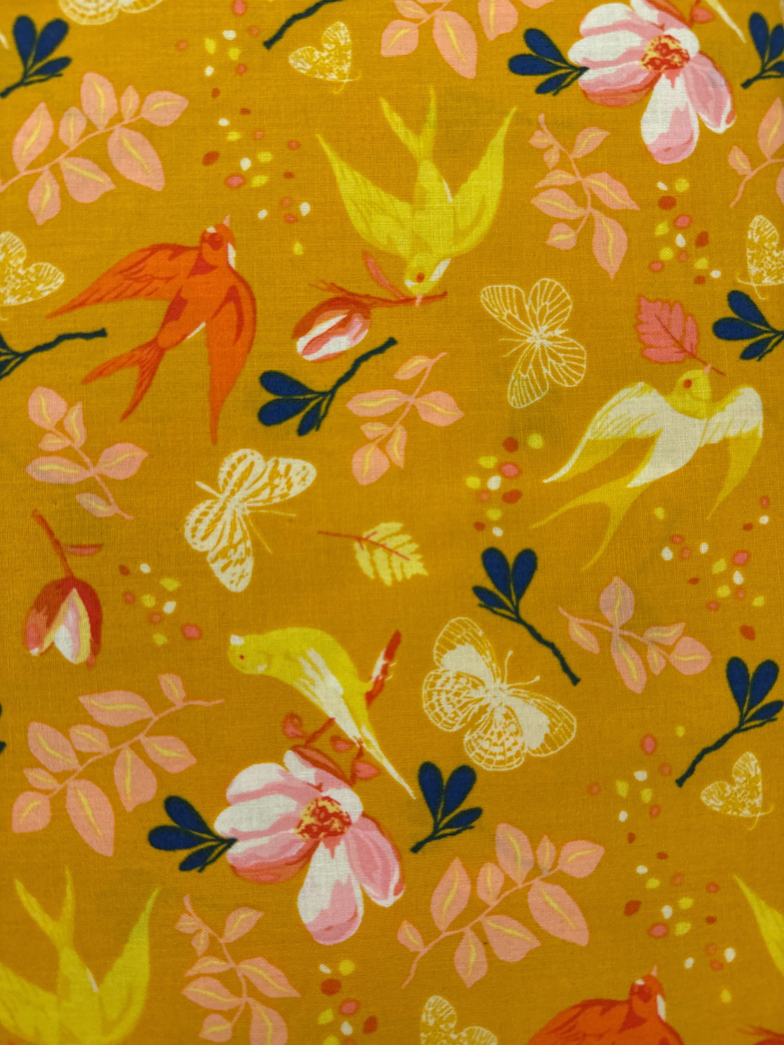 Lovely Doves Orange novelty quilting fabric by Windham Fabrics