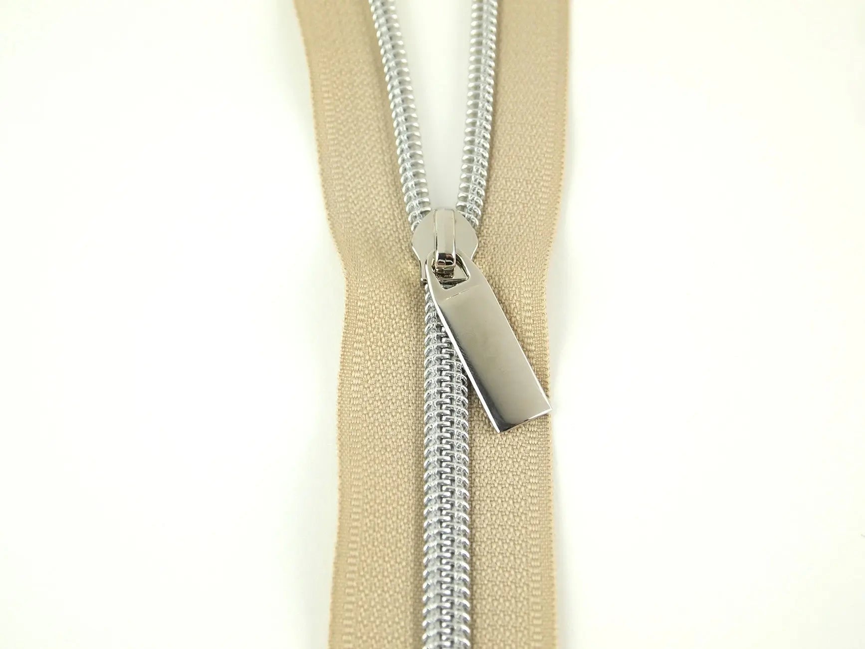 Beige #5 Nylon Nickel Coil Zippers: 3 Yards with 9 Pulls - Linda's Electric Quilters