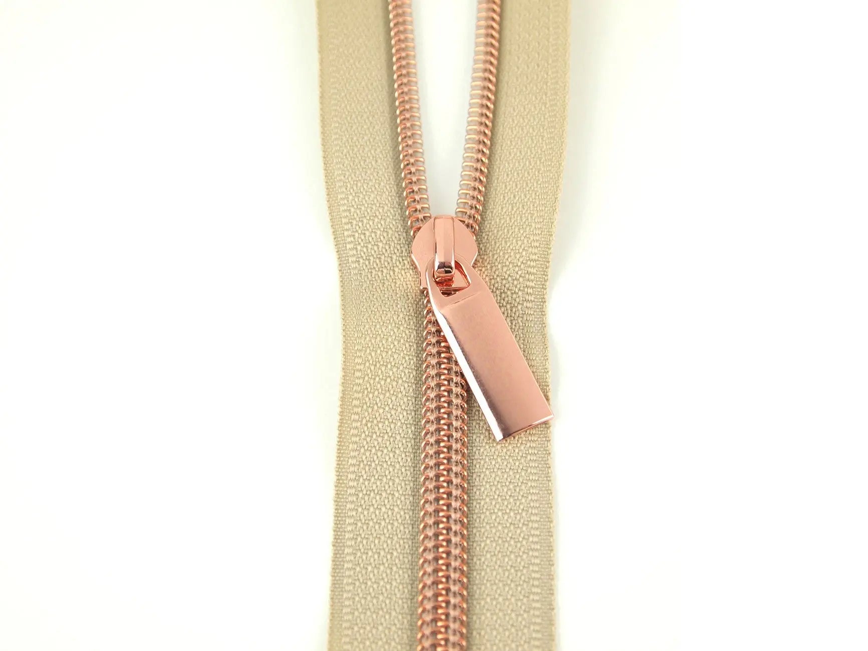 Beige #5 Nylon Rose Gold Coil Zippers: 3 Yards with 9 Pulls - Linda's Electric Quilters