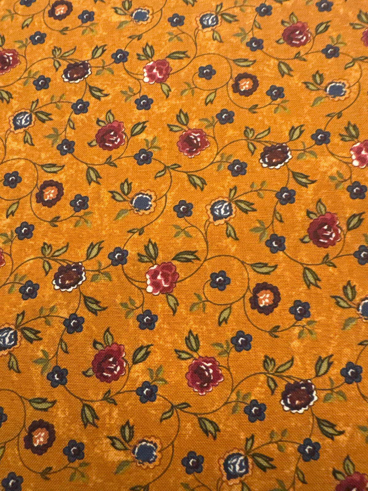 Daffodils and Dragonflies Amber floral quilting fabric by Moda