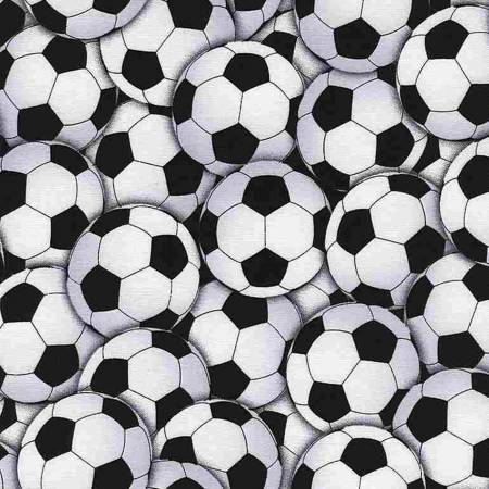 Timeless Treasures packed soccer balls quilting cotton fabric in White