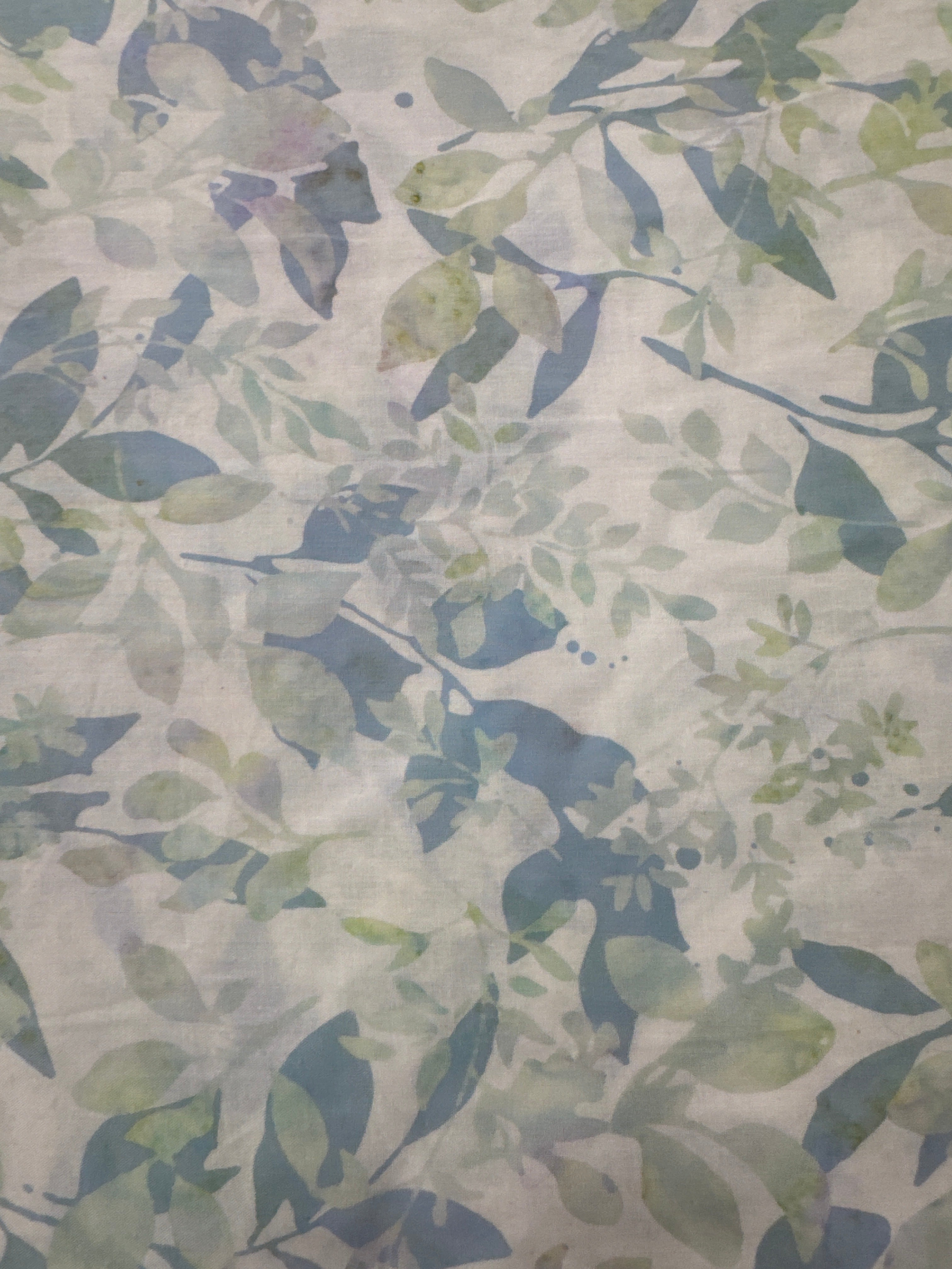 Blue Grape Leaves on White blender quilting fabric by Hoffman Fabrics