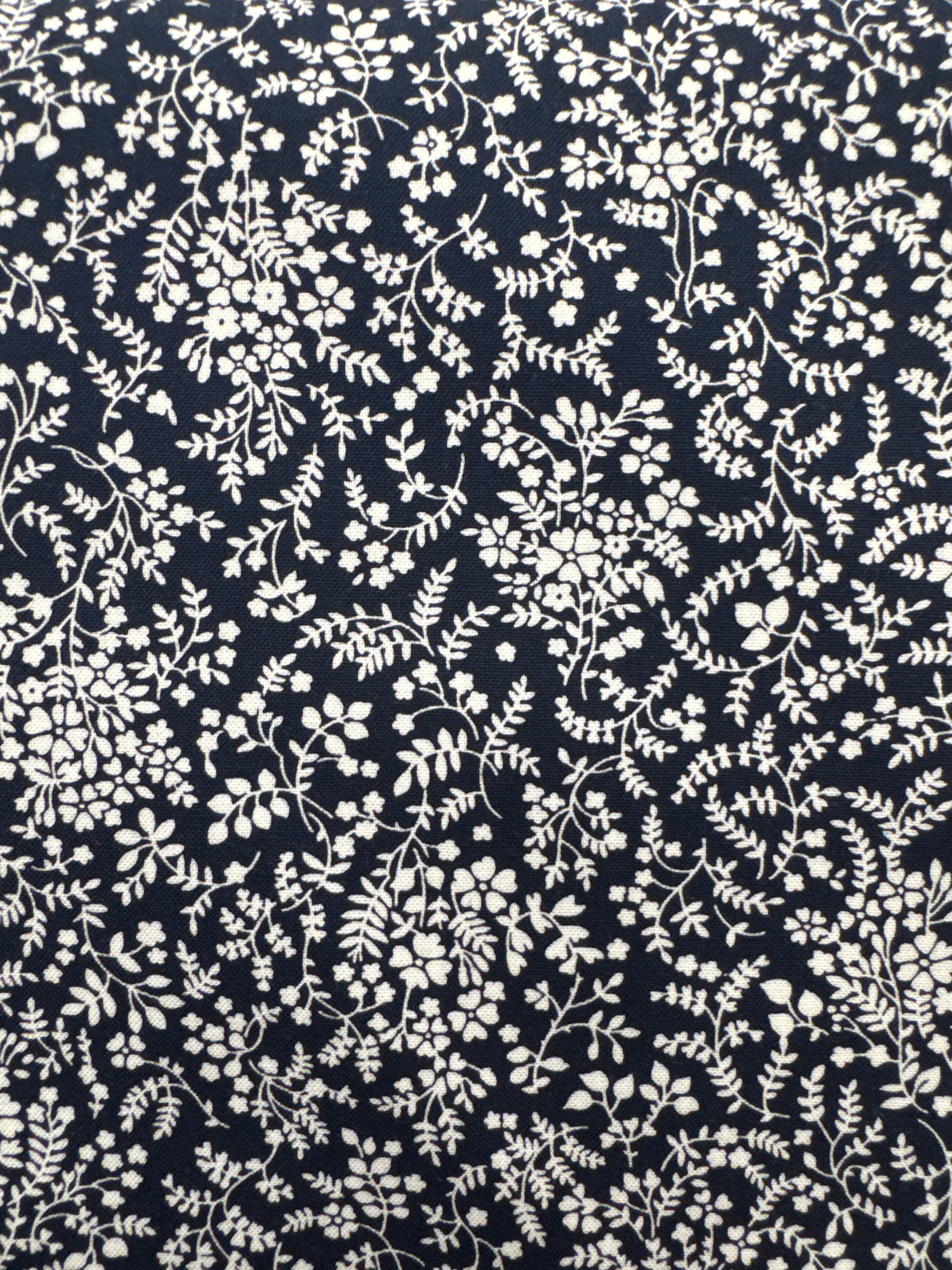 Shoreline White Small Floral on Black quilting fabric by Moda