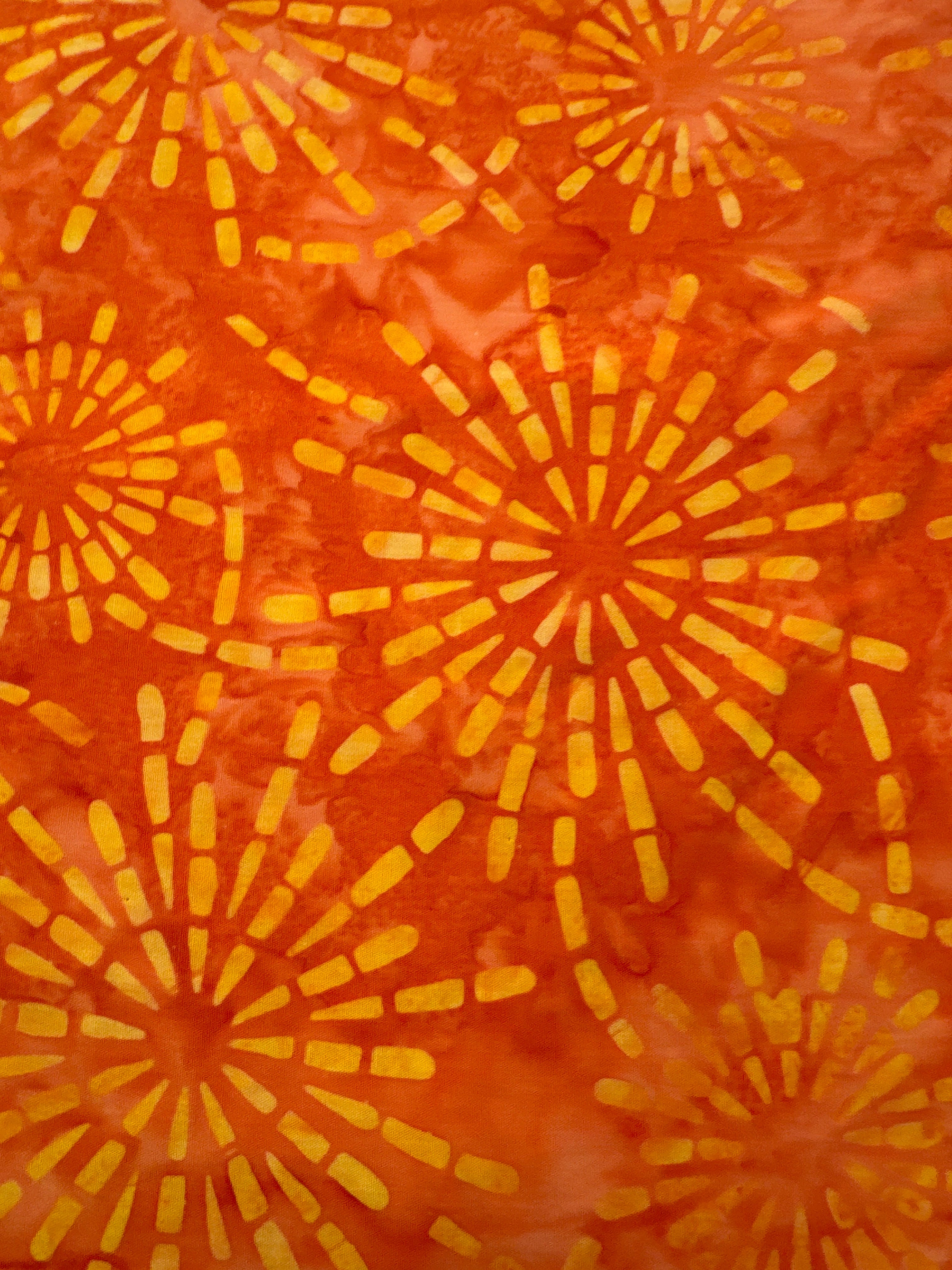 Chroma Batiks Yellow Flowers on Orange batik quilting fabric by Moda