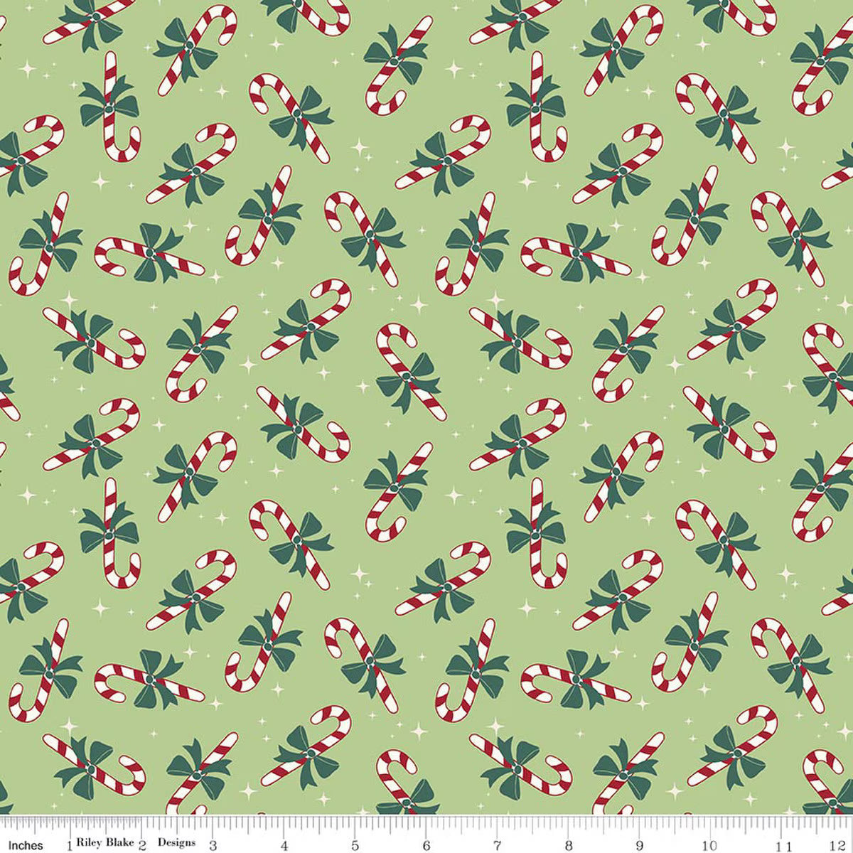 The North Pole Candy Cane Honeydew quilting fabric by Riley Blake