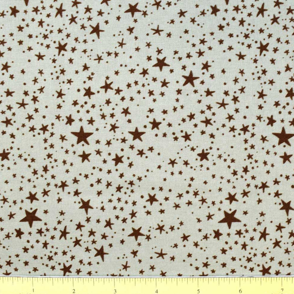 Mystic Moonlight Orange Stars Halloween quilting fabric by Rachel Hauer for Free Spirit