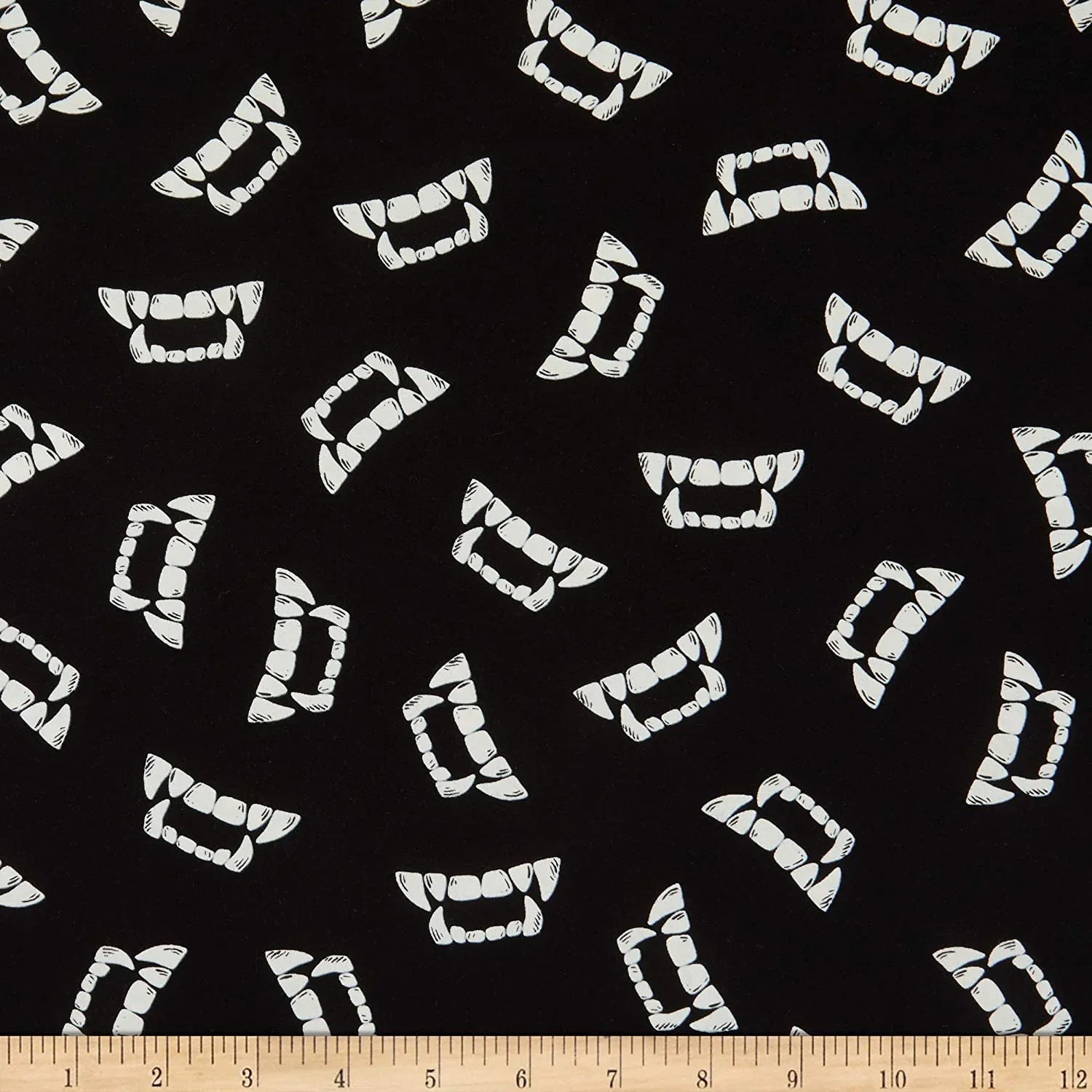 Fun Glow Vampire Teeth Halloween quilting fabric by Timeless Treasures