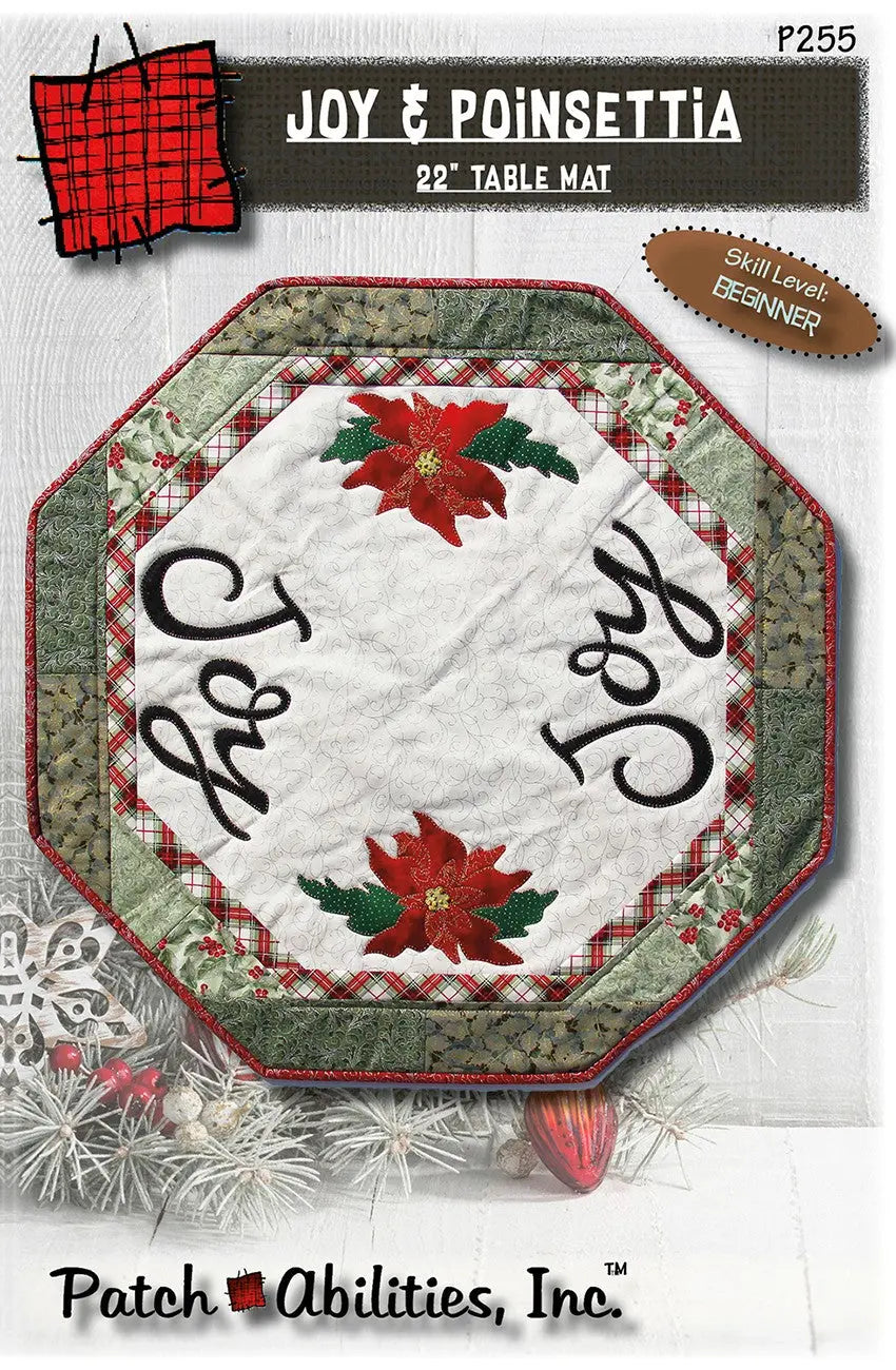Joy and Poinsettia 22" table mat - Linda's Electric Quilters