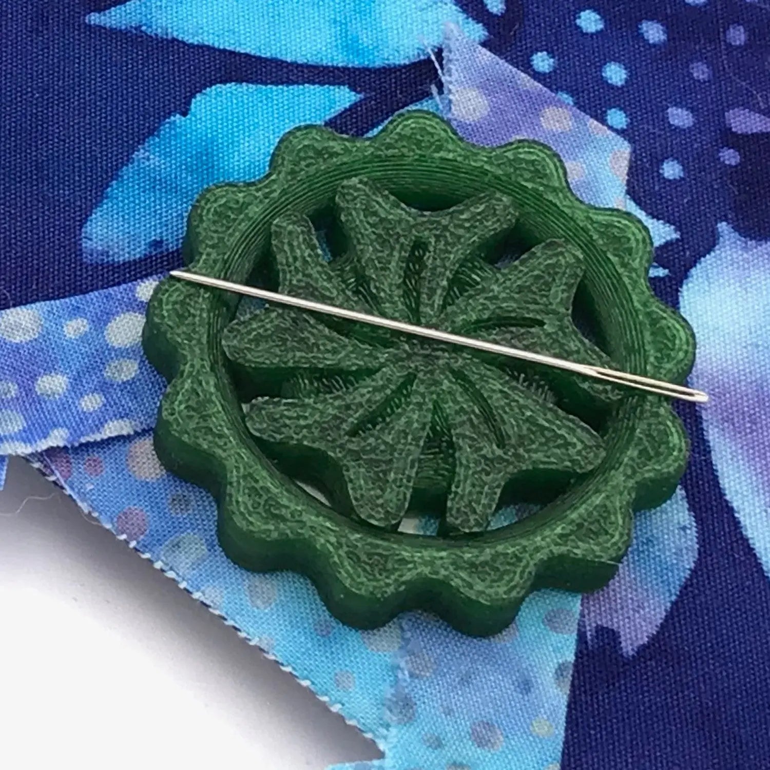 Needle Minder Emerald Checker Distributor