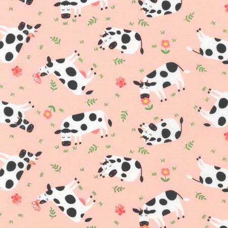 Robert Kaufman Cows Pink quilting cotton — friendly cows on pink