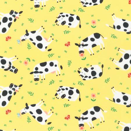 Robert Kaufman Cows Yellow quilting cotton — friendly cows on yellow