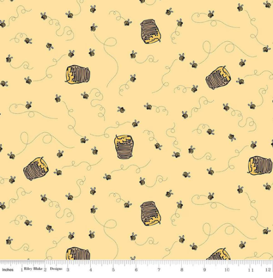 Winnie the Pooh Bees Sunshine novelty quilting fabric by Riley Blake