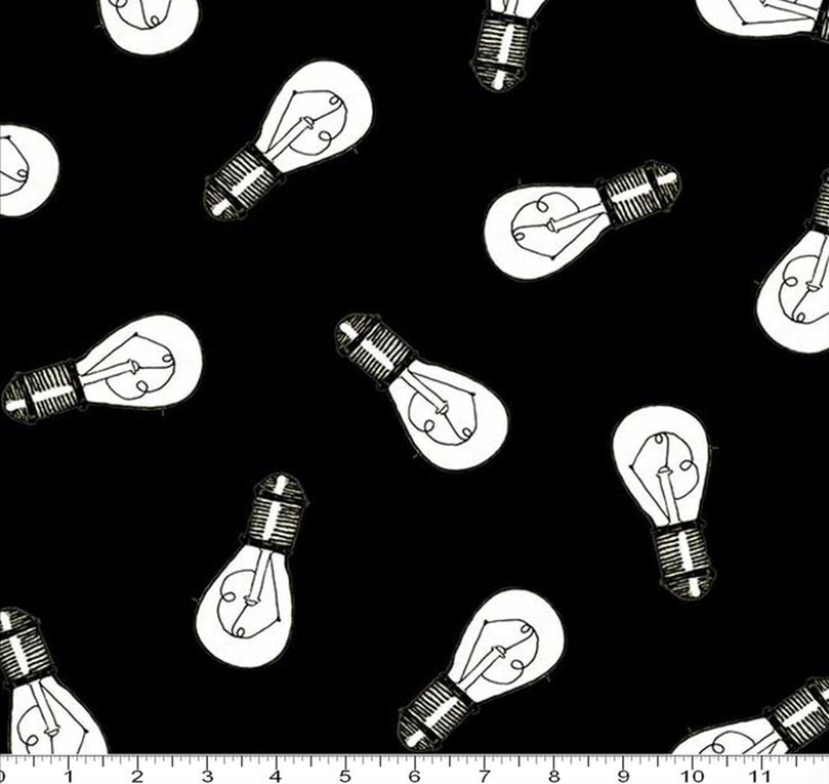 Hatters Tea Party Black Light Bulbs novelty quilting fabric by Quilting Treasures