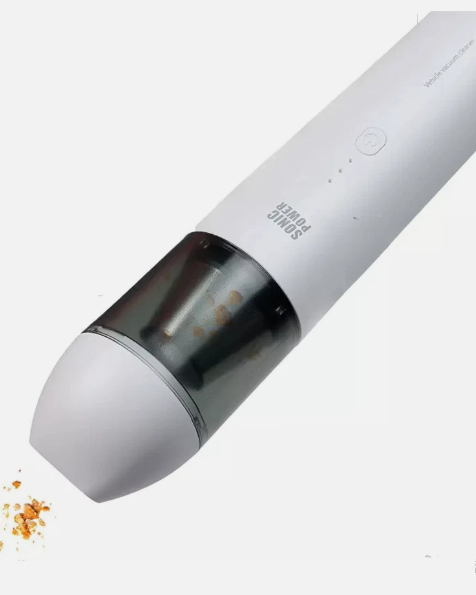 Sonic Power Mini Vacuum in use