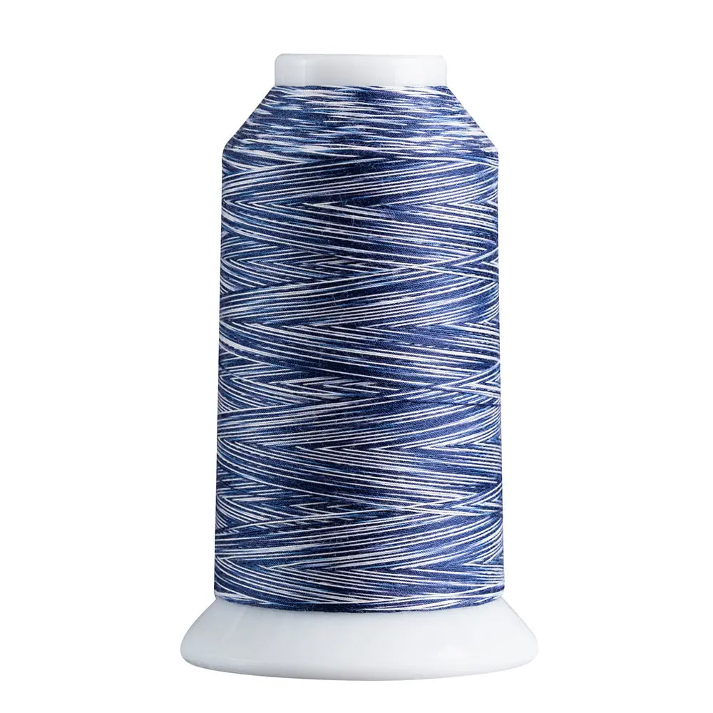Navy & White quilting and decorative stitching thread. Superior Spirit is a variegated, lint-free, matte-finish, smooth 40-wt. 3 filament polyester thread. Choose color options to match school or team colors and stitch a quilt for your favorite athlete or fan. Perfect for T-shirt quilts or embroideries. Pair with So Fine! as a bobbin thread for perfect stitches.