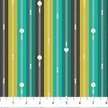 A Cozy Throw Quilt in Bits And Bobs Zippers Teal