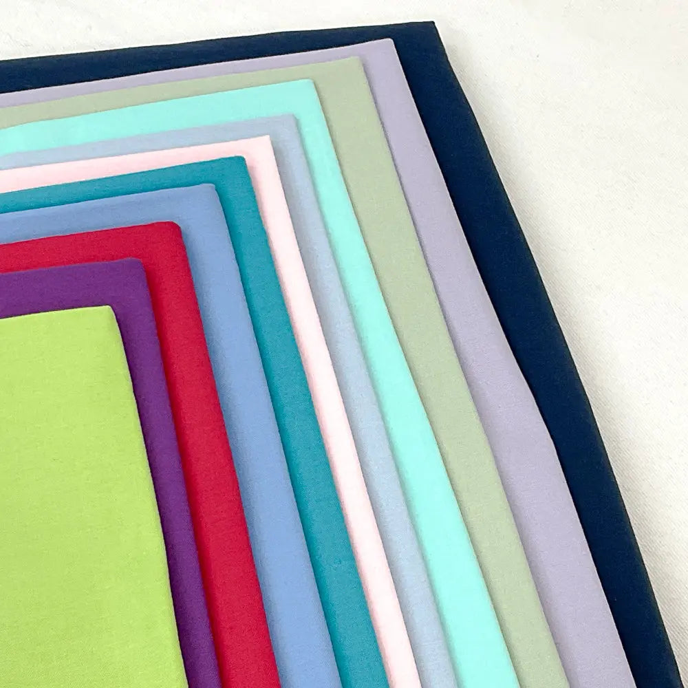A Cozy Throw Quilt in Lancaster Square Solids