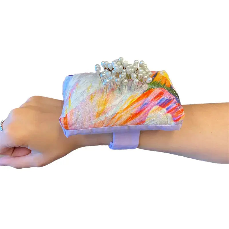 How to Use a Wool Filled Pin Cushion Wristlet: Keep Pins Sharp and Within Reach