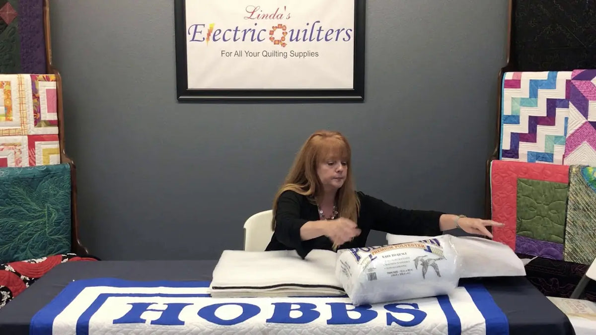 Stephanie Hackney of Hobbs Bonded Fibers showing Thermore, Poly-Down and Cloudloft polyester batting