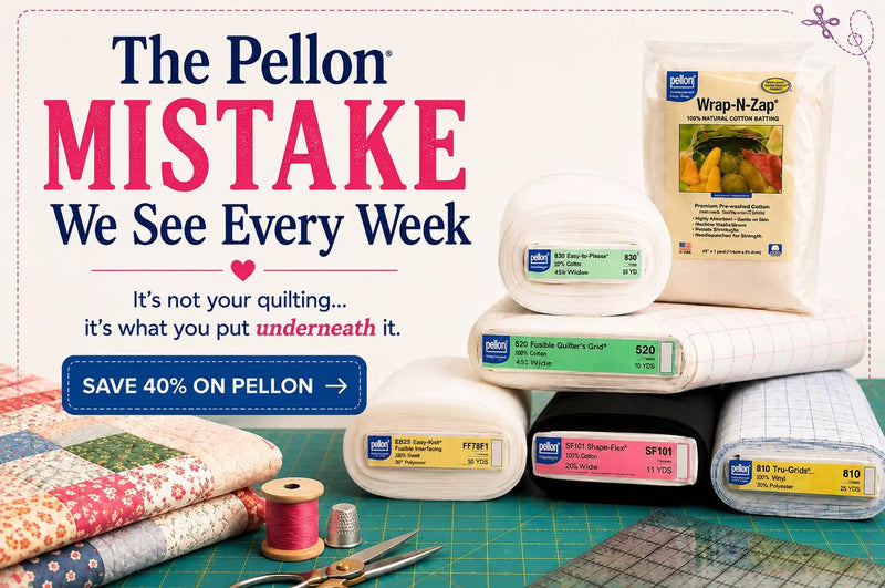 A flat lay of Pellon products, including rolls of interfacing and batting, alongside quilting supplies like scissors and a thimble