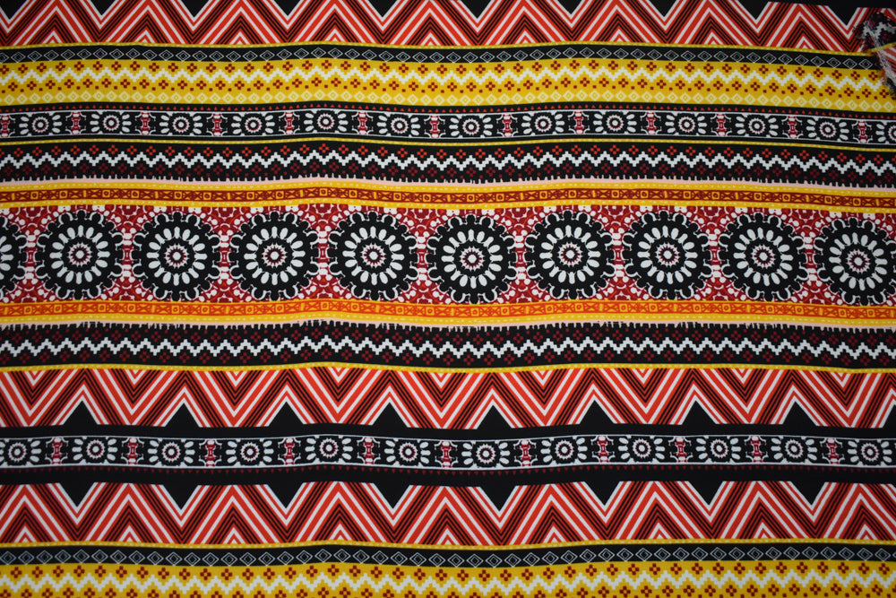 Red-Multi Poly Floral Aztec Stripe Border Printed Pebble Crepe Woven Fabric