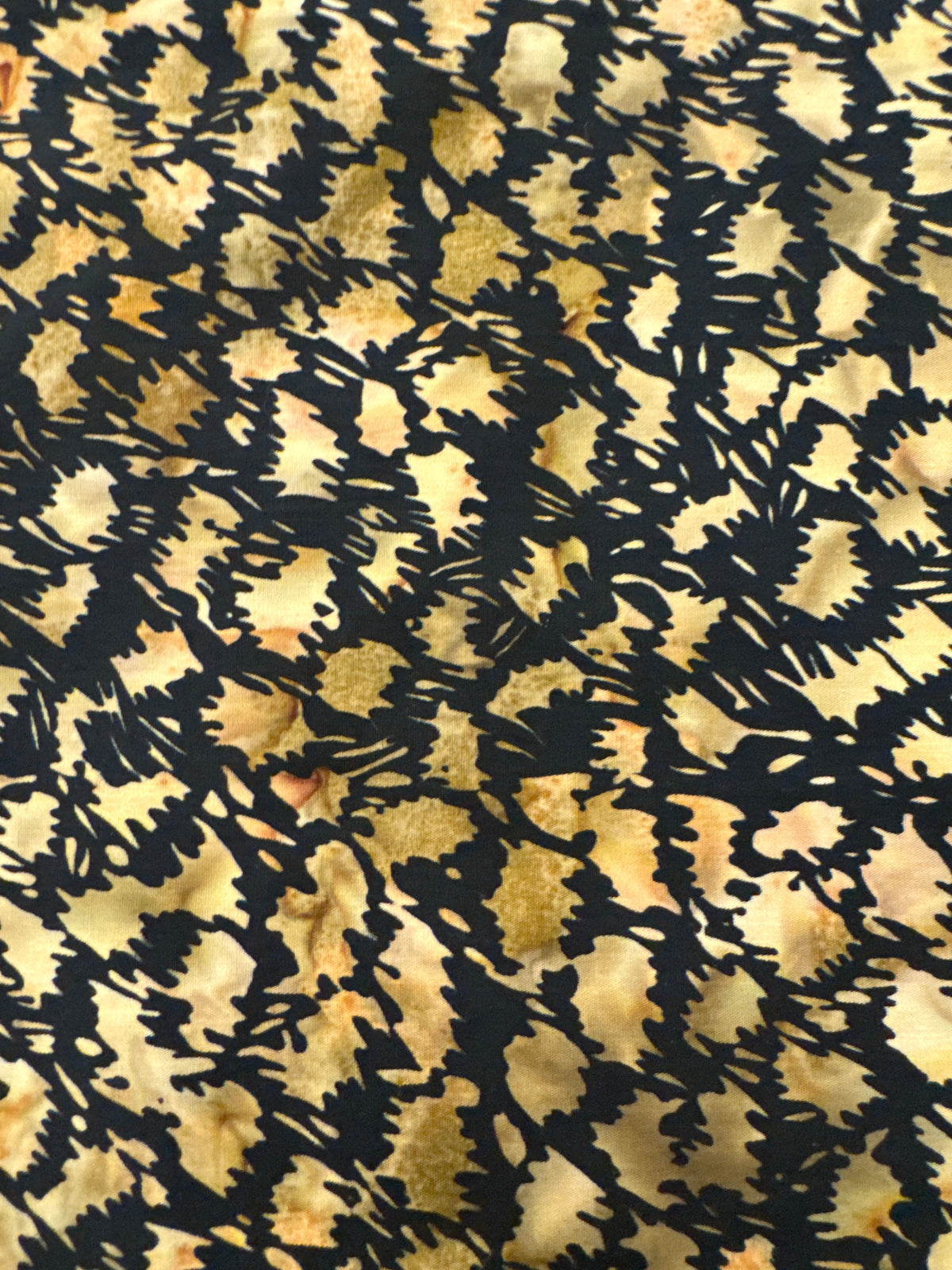 Scratched Up Tan on Black blender quilting fabric by In The Beginning Fabrics