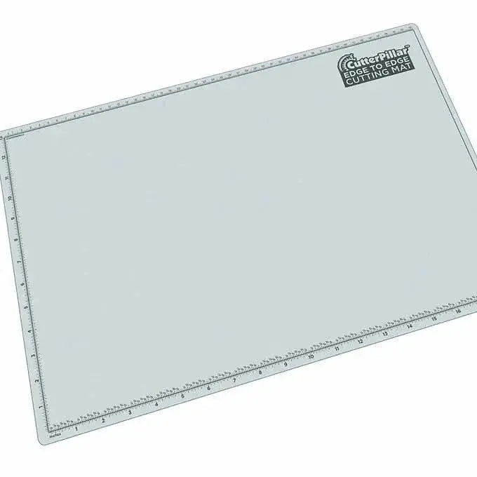 CUTTERPILLAR GLOW PREMIUM AND BASIC GRIDLESS SELF-HEALING CUTTING MAT CutterPillar