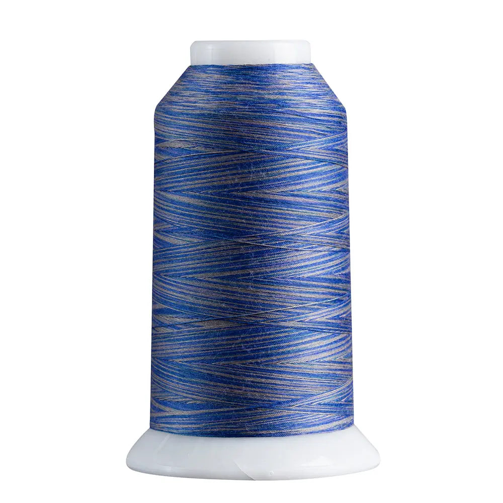 Blue & Gray quilting and decorative stitching thread. Superior Spirit is a variegated, lint-free, matte-finish, smooth 40-wt. 3 filament polyester thread. Choose color options to match school or team colors and stitch a quilt for your favorite athlete or fan. Perfect for T-shirt quilts or embroideries. Pair with So Fine! as a bobbin thread for perfect stitches.