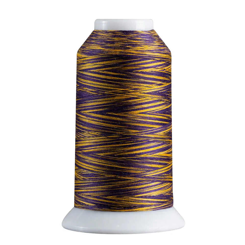 Purple & Gold quilting and decorative stitching thread. Superior Spirit is a variegated, lint-free, matte-finish, smooth 40-wt. 3 filament polyester thread. Choose color options to match school or team colors and stitch a quilt for your favorite athlete or fan. Perfect for T-shirt quilts or embroideries. Pair with So Fine! as a bobbin thread for perfect stitches.