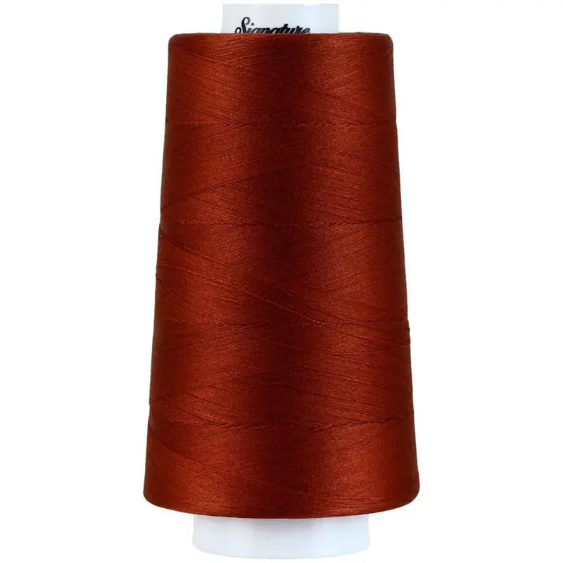 245 Rust Signature Cotton Thread - Linda's Electric Quilters